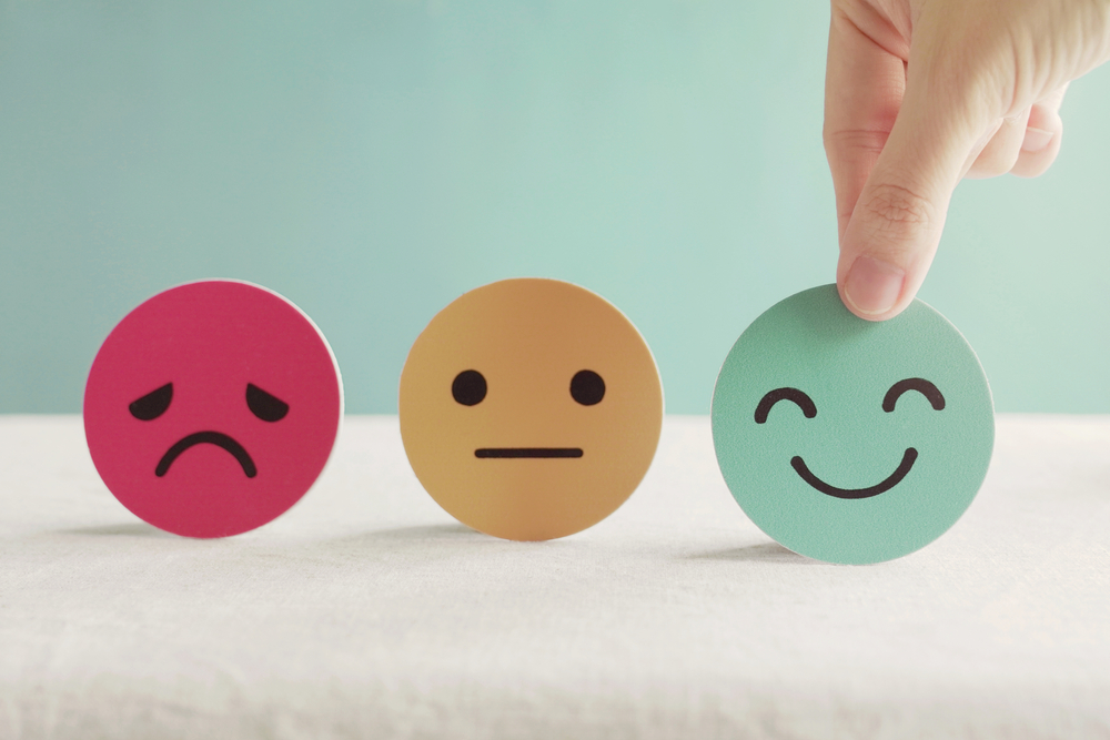 sad, neutral, and happy face stickers