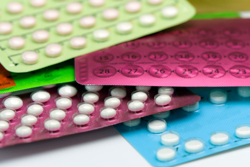 stack of birth control pill packs