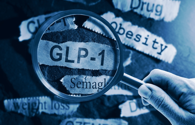 magnifying glass over label GLP-1 surrounded by related words
