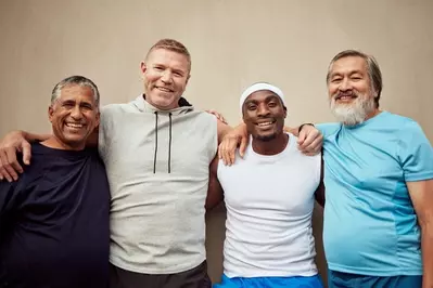smiling men in fitness attire